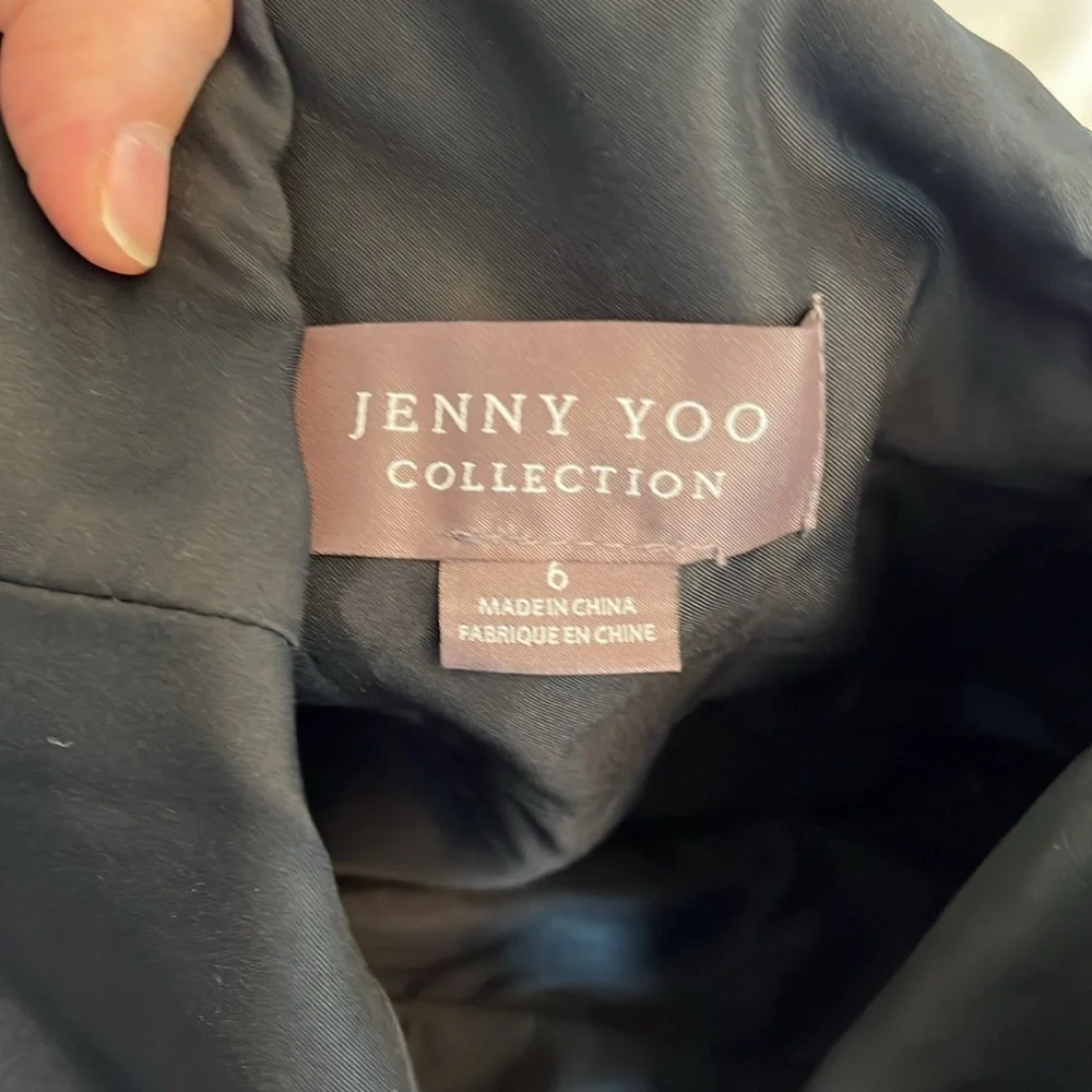 Jenny Yoo Cassie
Flutter Sleeve
Surplice Gown
Black with Floral Pattern. - Picture 9 of 16